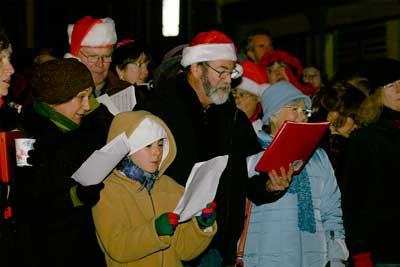 Islanders join together at Memorial Park to sing holiday favorites at the 2011 Island Lights Festival