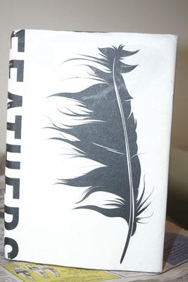 The cover of Thor Hanson’s latest book “Feathers.”