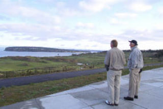 Rich Rae and Dick Goff take in the view at Chambers Bay.