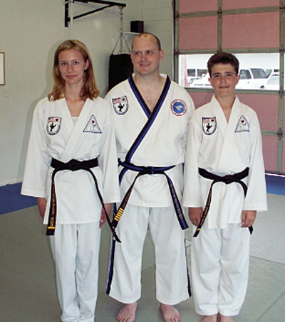 Me’tairie Kilpatrick-Boe and Michael Hoeller were recently presented with their first-degree black belts by their instructor