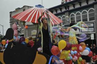 Duck Soup Inn chef and owner Gretchen Allison blows huge bubbles from the back of the Duck Soup Inn float at Friday's Parade.