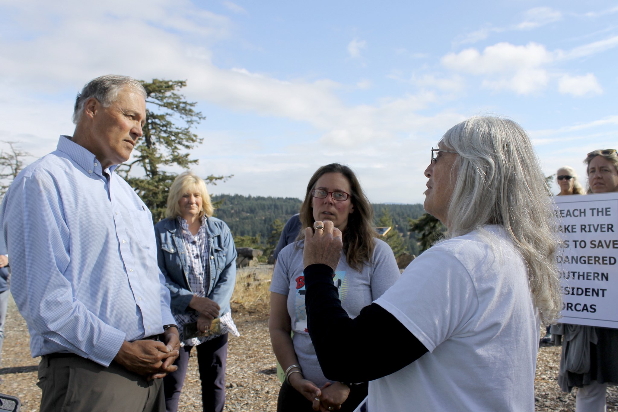 Gov. Inslee meets with orca advocates on top of Mt. Grant