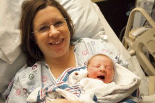 Jennifer Johnson and her newborn son Gus Johnson.