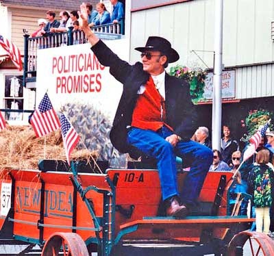 EJ Thorndike sits atop a signature 'red wagon' in the 1999 Fourth of July Day parade in Friday Harbor.