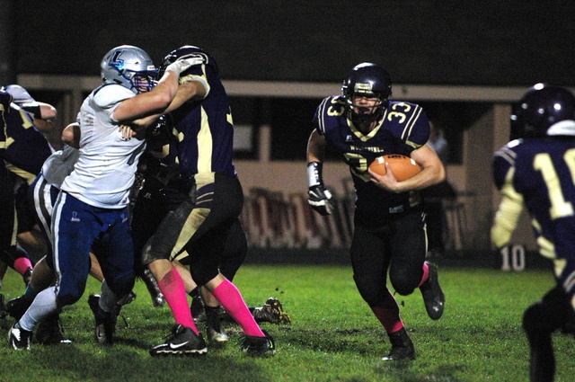 Contributed photo/John StimpsonKai Herko (#33) breaks free for much needed yardage against the La Connor Braves.