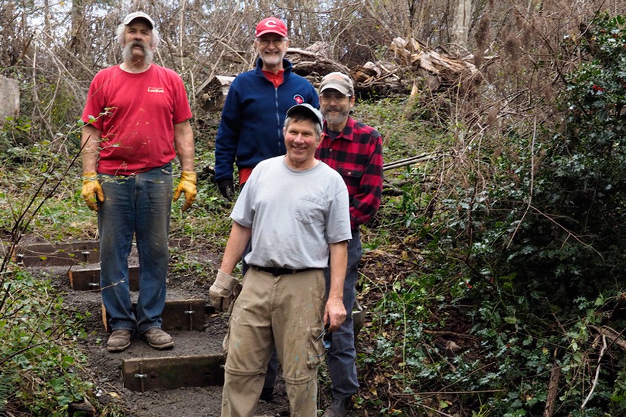 Volunteers build steps to ease six-mile trail