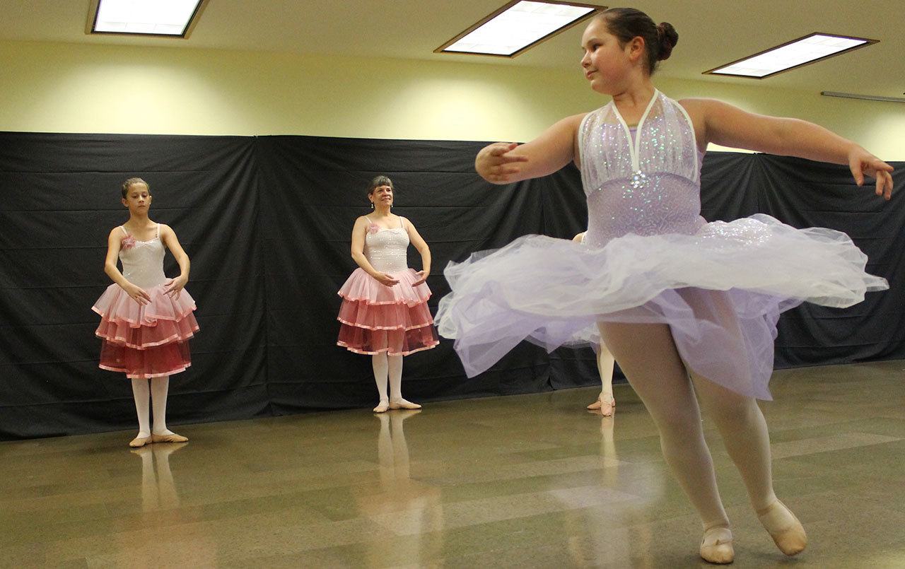 Eleanore Rollins, 12, dances as a Lavender Fairy in a rehearsal for “The Nutcracker.”