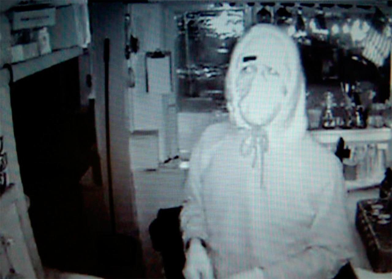 Contributed photo/San Juan County Sheriff’s Office                                Surveillance video from Mijitas in Eastsound caught a burglar, possibly linked to other break-ins. He is suspected to be more than 6 feet tall.