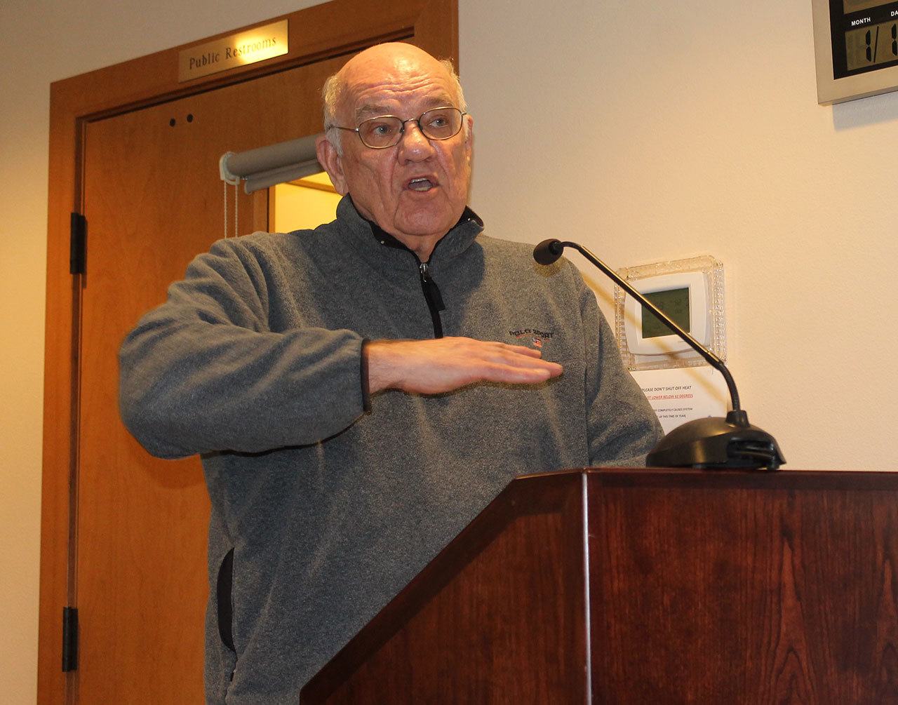 Staff photo/Hayley Day                                Larry Bailey, who lives off Meadow Lane on Lopez, speaks against the sale of the Clure property to the San Juan County Land Bank at the Jan. 10 San Juan County Council meeting.