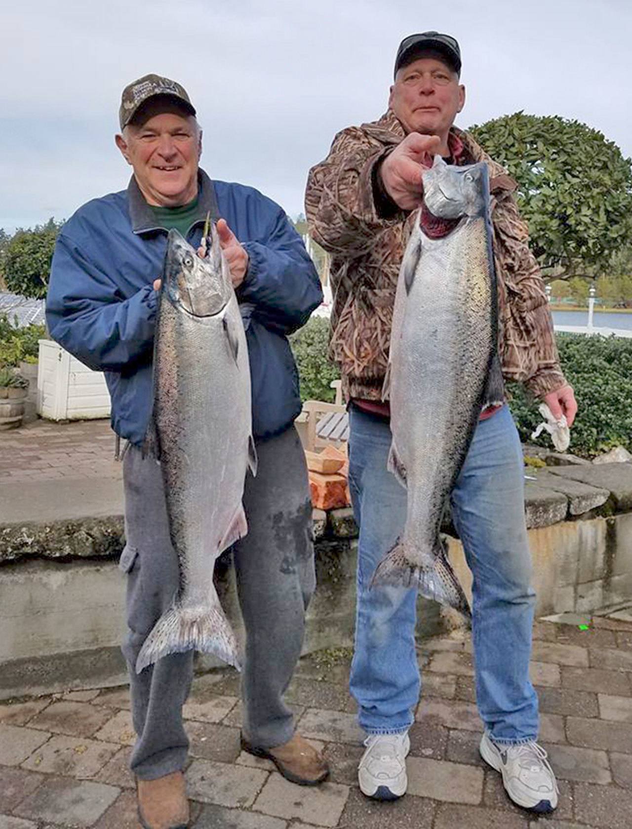 Contributed photo                                Pictured left is derby winner Jerry Thomas with his 18.12 pound Chinook salmon. On the right is fourth and fifth place winner Larry Quesnell, with the fifth place fish of 12.8 pounds.