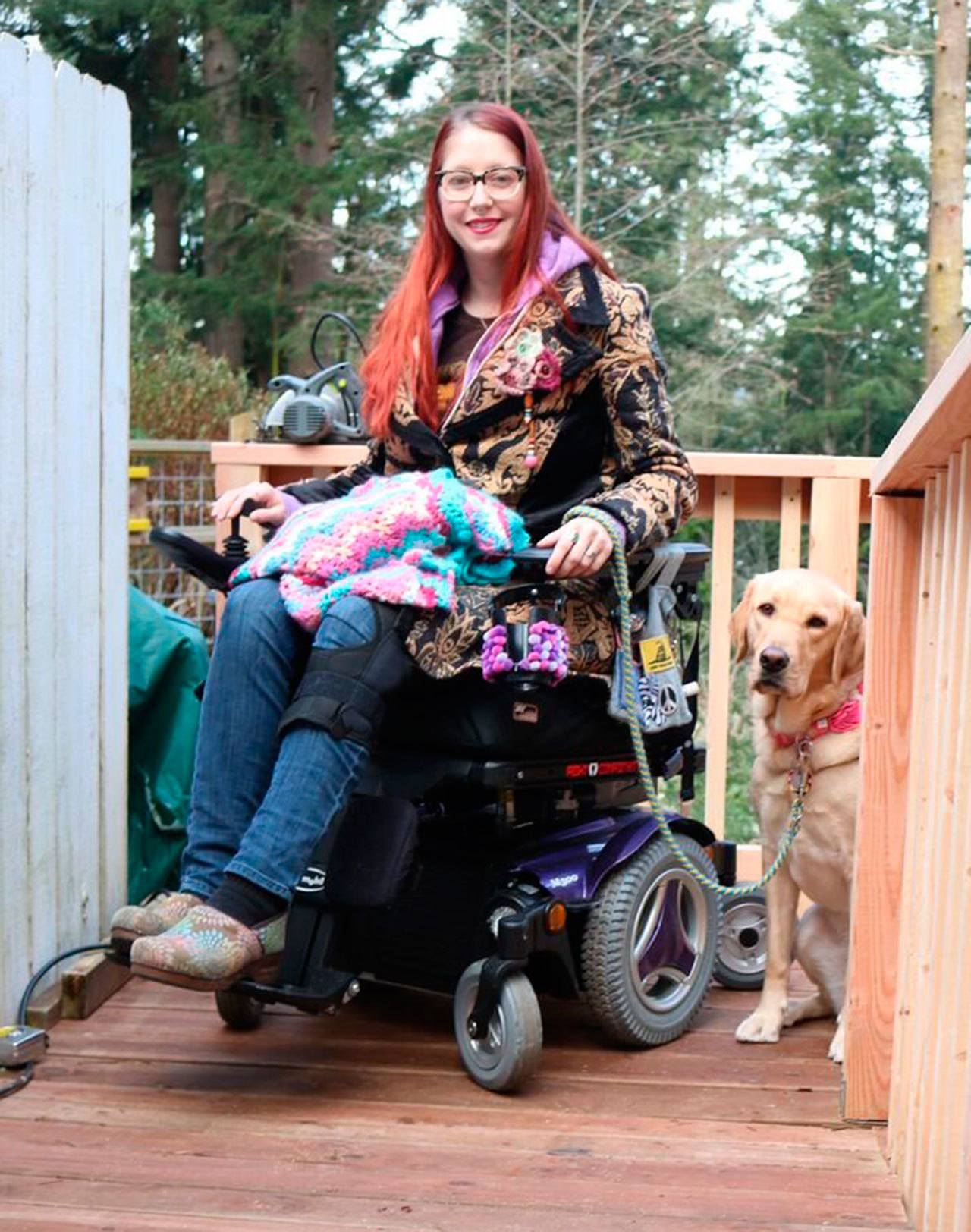 Contributed photo/Laura Davis-Robeson                                Dani Davis-Robeson uses her wheelchair ramp for the first time on Jan. 15.