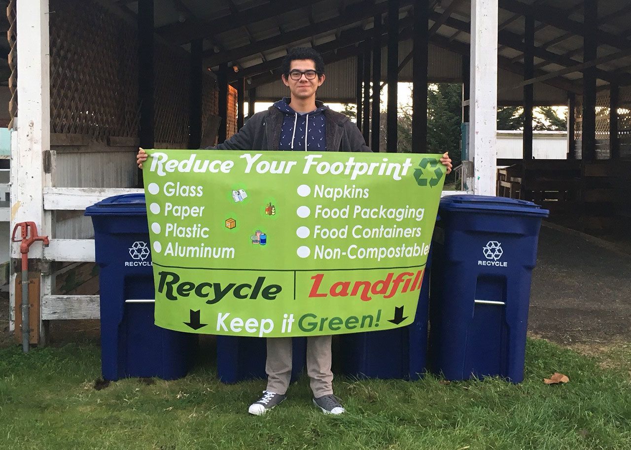 Contributed photo/San Juan County Parks, Recreation and Fair Department                                Claudio Ochoa-Garcia worked on placing recycle bins and informational signage at the fairgrounds.