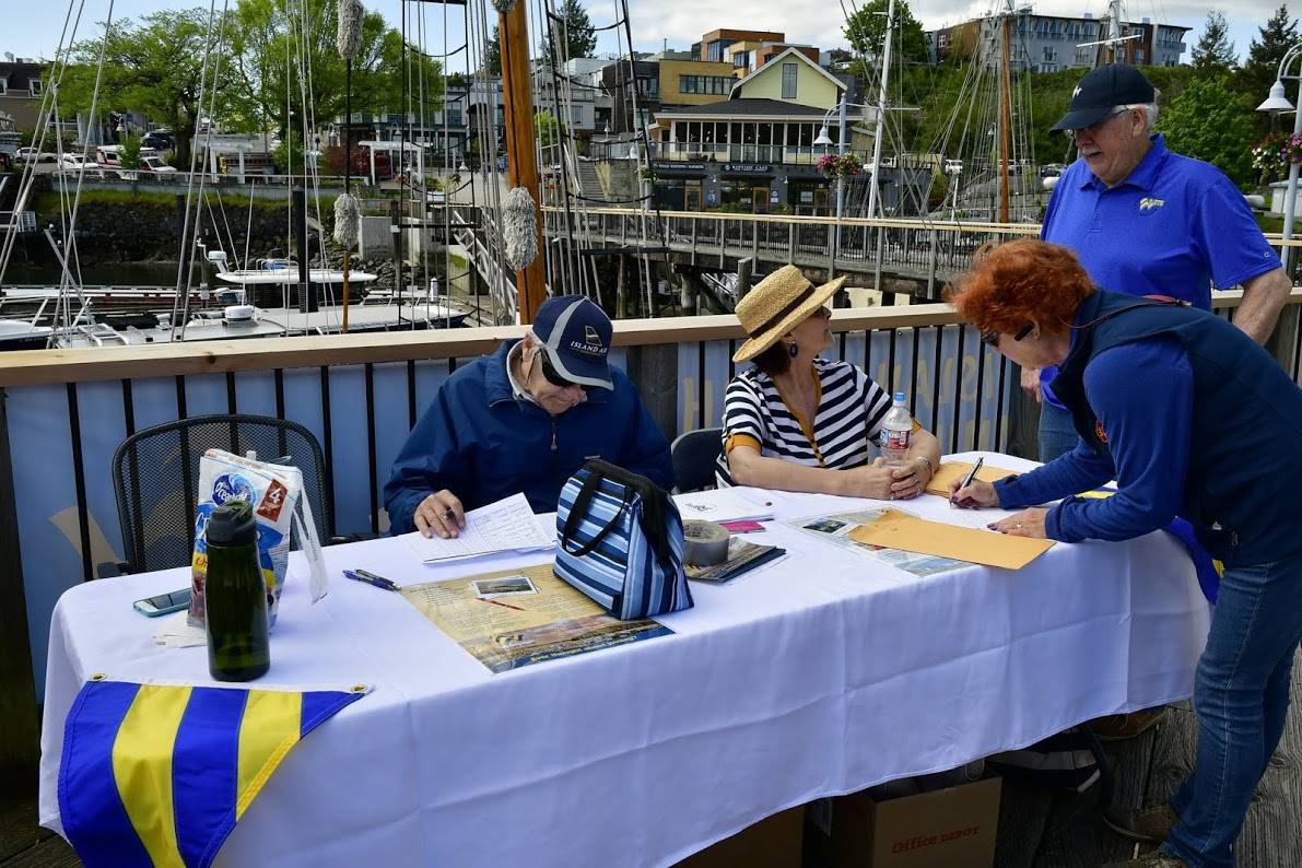 Contributed photo/Bill Waxman, San Juan Island Yacht Club photographer                                This was the first year the event included information tables from first responders before the parade started.