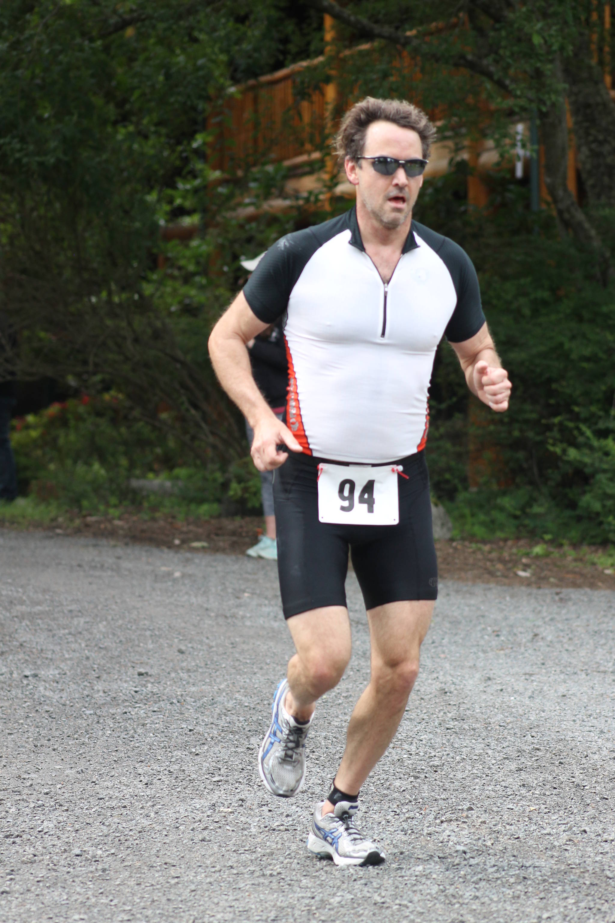 Staff photo, Heather Spaulding. Triathalon Sprint winner Keith Szot approaches the finish line.