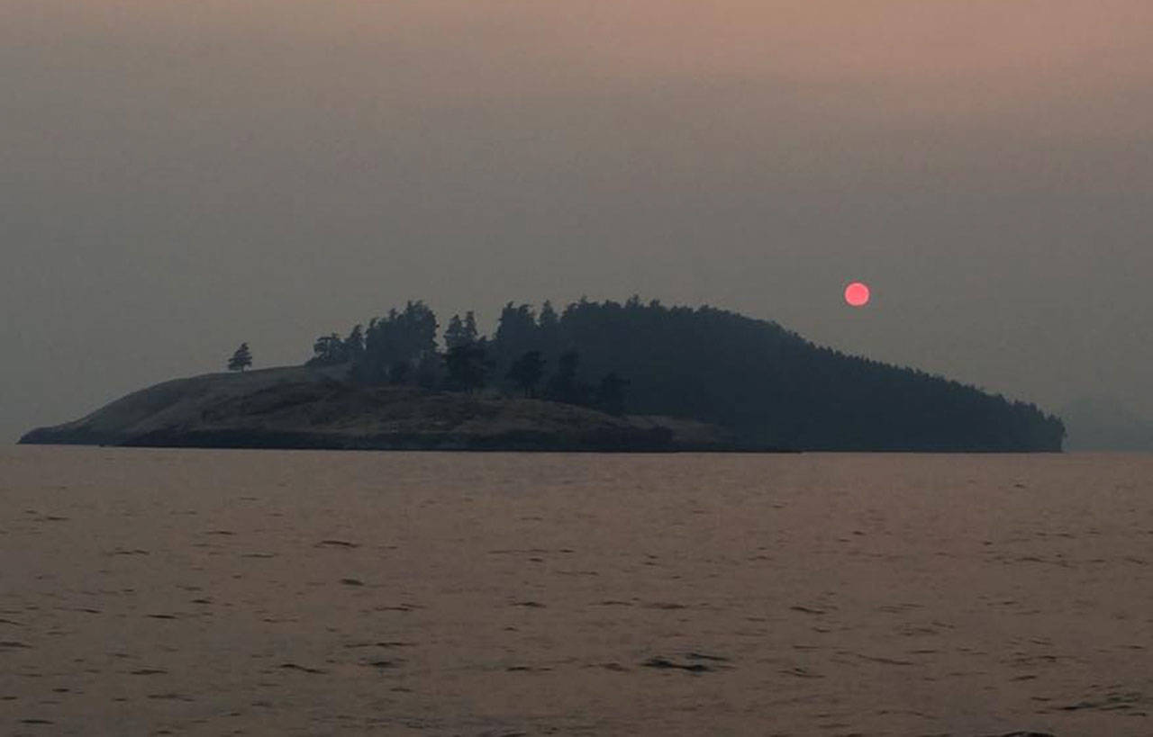 Contributed photo                                The sun is blocked by smoke over Speiden Island.