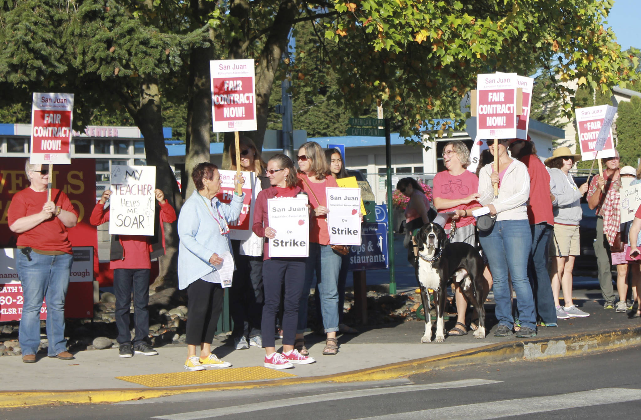 Staff photo/Hayley Day                                Teachers picket in front of Wells Fargo on the corner of Spring Street and Argyle Avenue on Sept. 1.