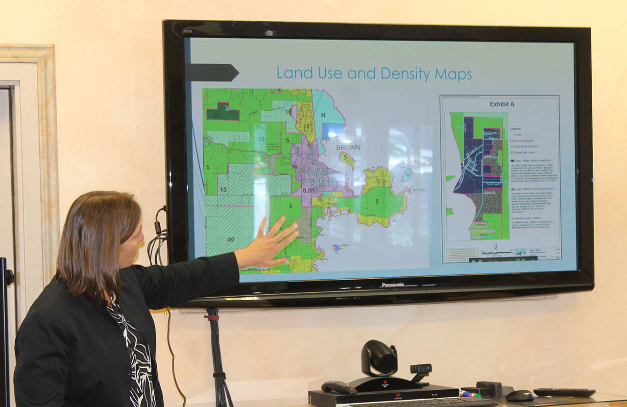 Staff photo/Hayley Day                                San Juan County Community Development Director Erika Shook explains the county’s land-use map at the League of Women Voters meeting on Sept. 11.