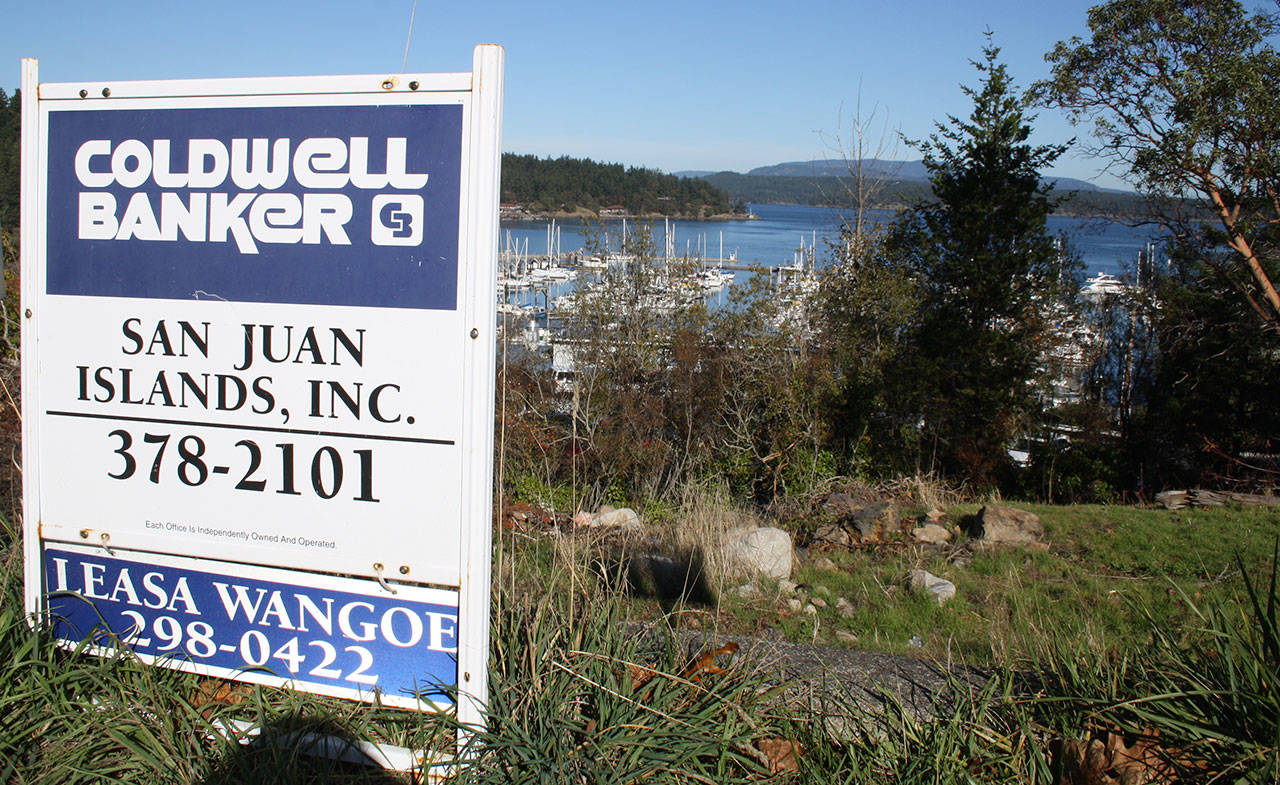 Staff photo/Hayley Day                                The trees on the two lots were razed last summer.