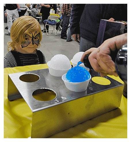 Contributed photo/www.islandrecfans.org                                A carnival attendee awaits a snow cone at the 2016 festival.