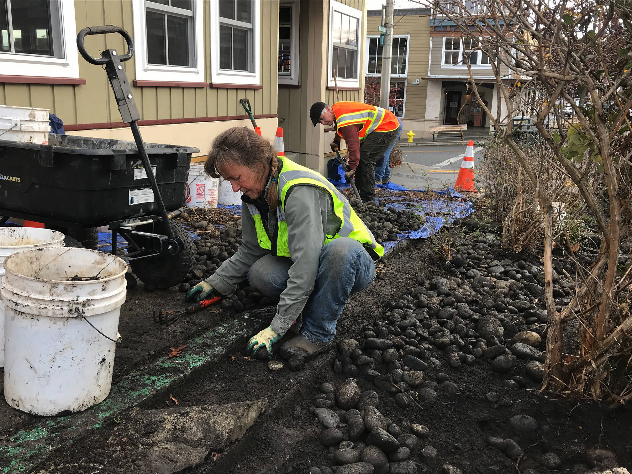 Contributed photo/Matt Pranger                                Megan Jones works on the rain garden with Sarena Schumacher.
