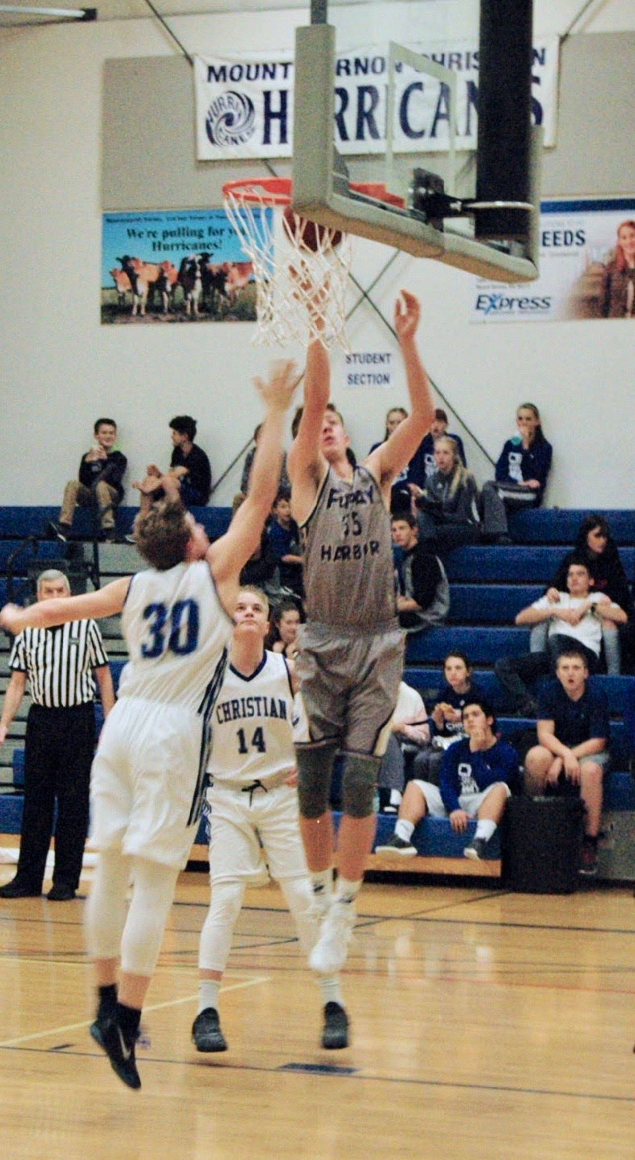 Contributed photo/John Stimpson                                Marshall “Mellow” Clark scores 2 points more for the Friday Harbor Wolverines.