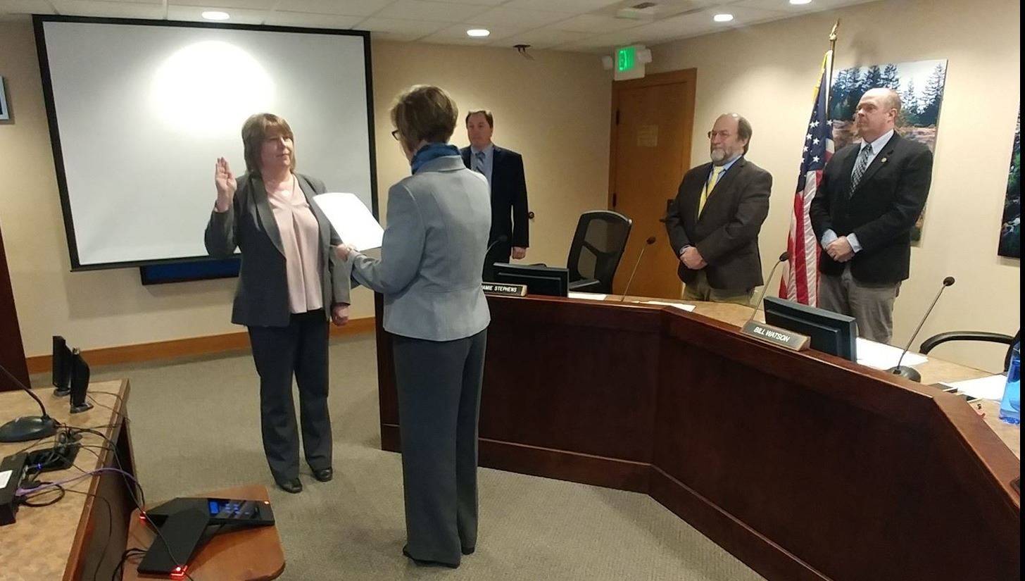 Contributed photo/San Juan County                                San Juan County Superior Court Judge Katie Loring swears in newly appointed San Juan County Clerk Lisa Henderson.