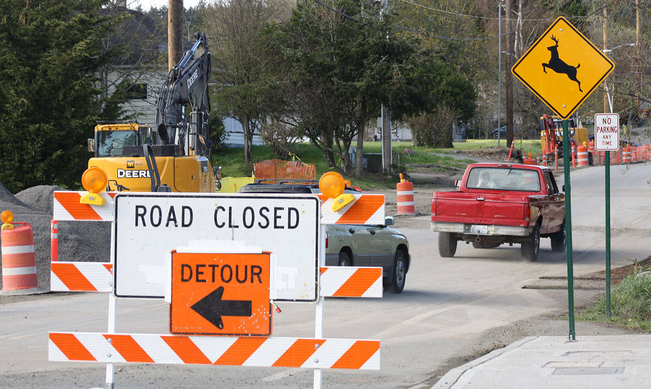 Staff photo/Hayley Day                                Two drivers bypass the detour signs on Tucker Avenue on April 10.