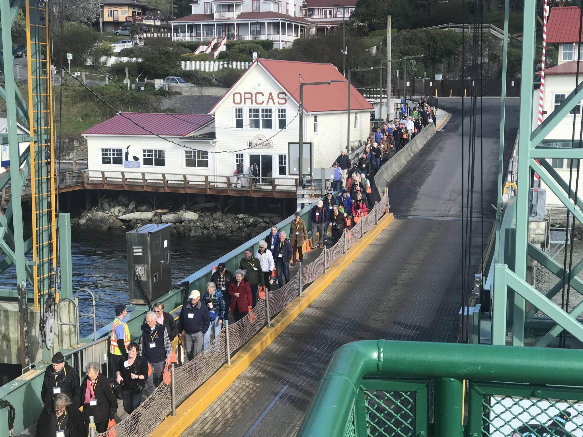 Contributed photo/OPALCO                                Co-op members board the ferry for the annual meeting.