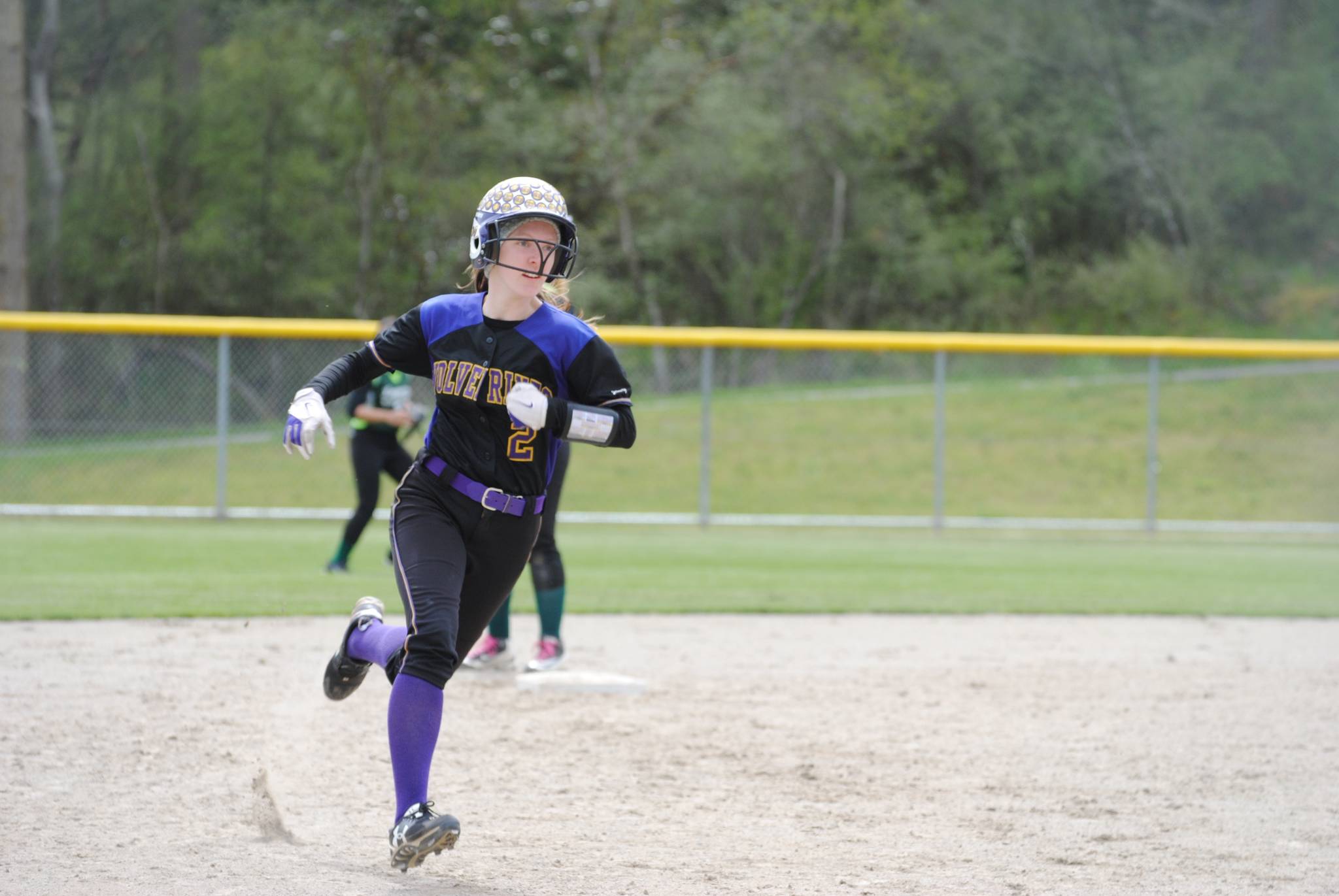 Staff photo/Tate Thomson                                Thea Sietz runs to third.