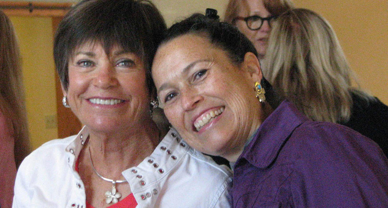 Contributed photo/Women’s Fund                                San Juan Island Women’s Fund members Sally Shannon and Mariluz Villa at an annual luncheon.
