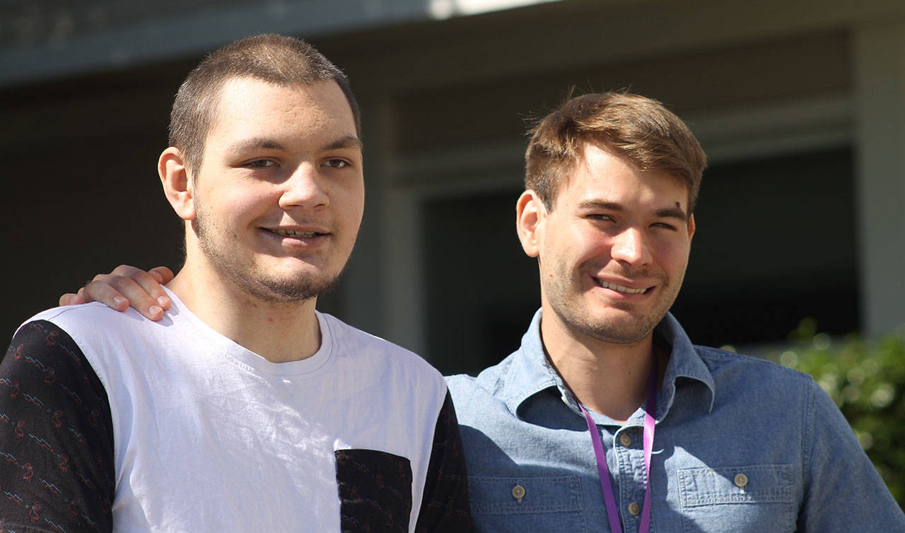 Staff photo/Hayley Day                                Student Quincy Vague and speaker Adrian Rodriguez meet outside the Friday Harbor High School.