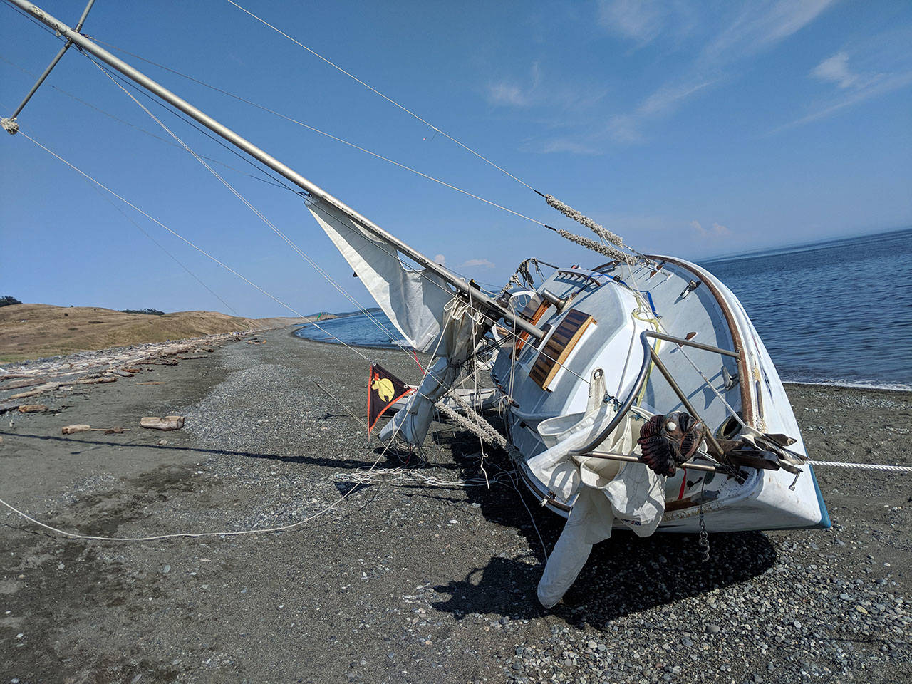 Contributed photo/Dante Aubert                                A 26-foot Haida sailboat ran aground at South Beach on June 19.