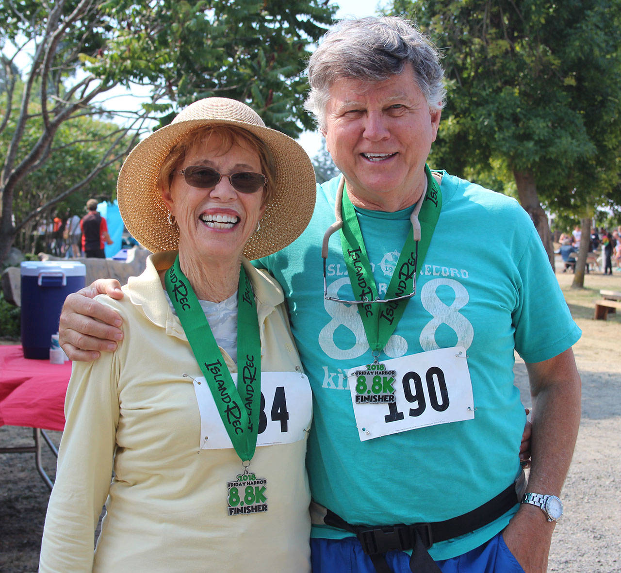 Staff photo/Hayley Day                                Participants attend the medal ceremony after the race.
