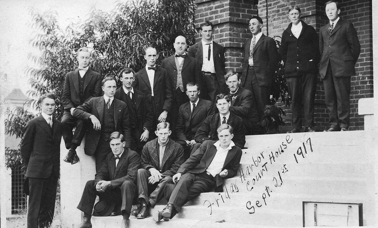 Contributed photo                                Soldiers pose on the steps of the San Juan County Courthouse in 1917.