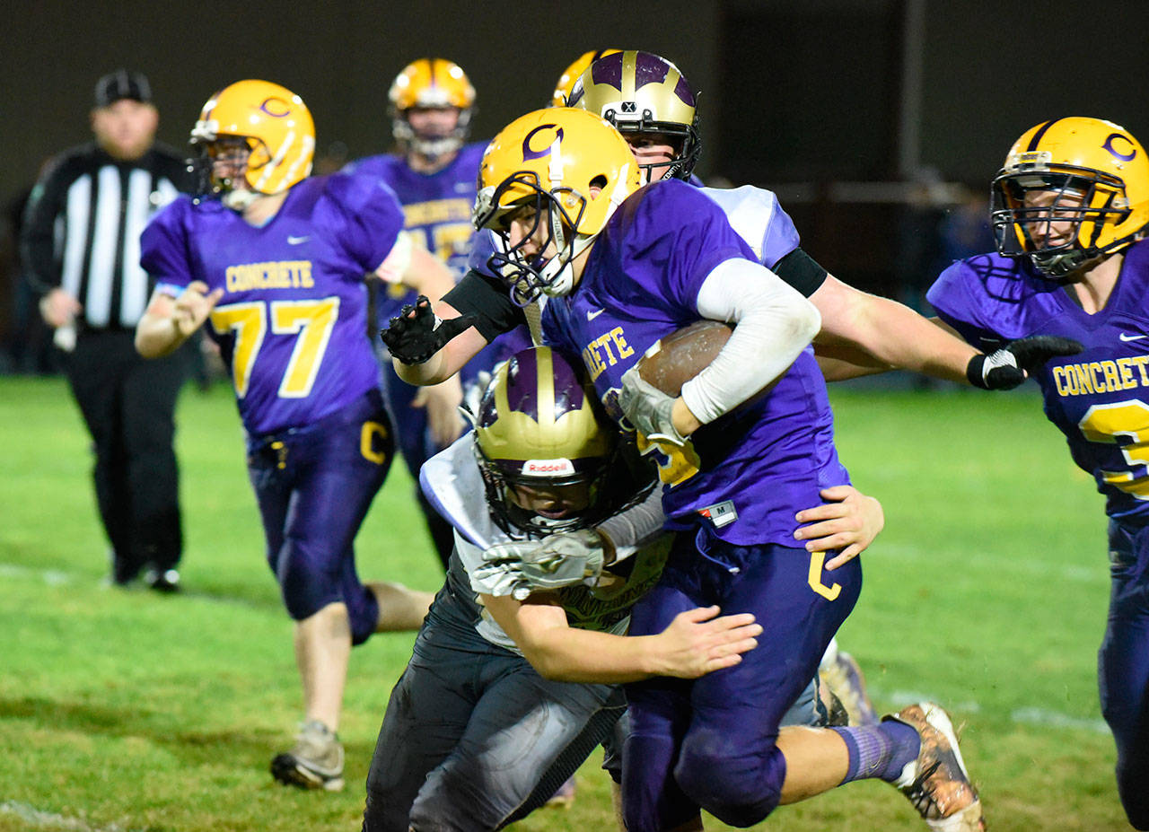 Contributed photo/John Stimpson                                Wolverine Teagan August brings down a Lion running back.