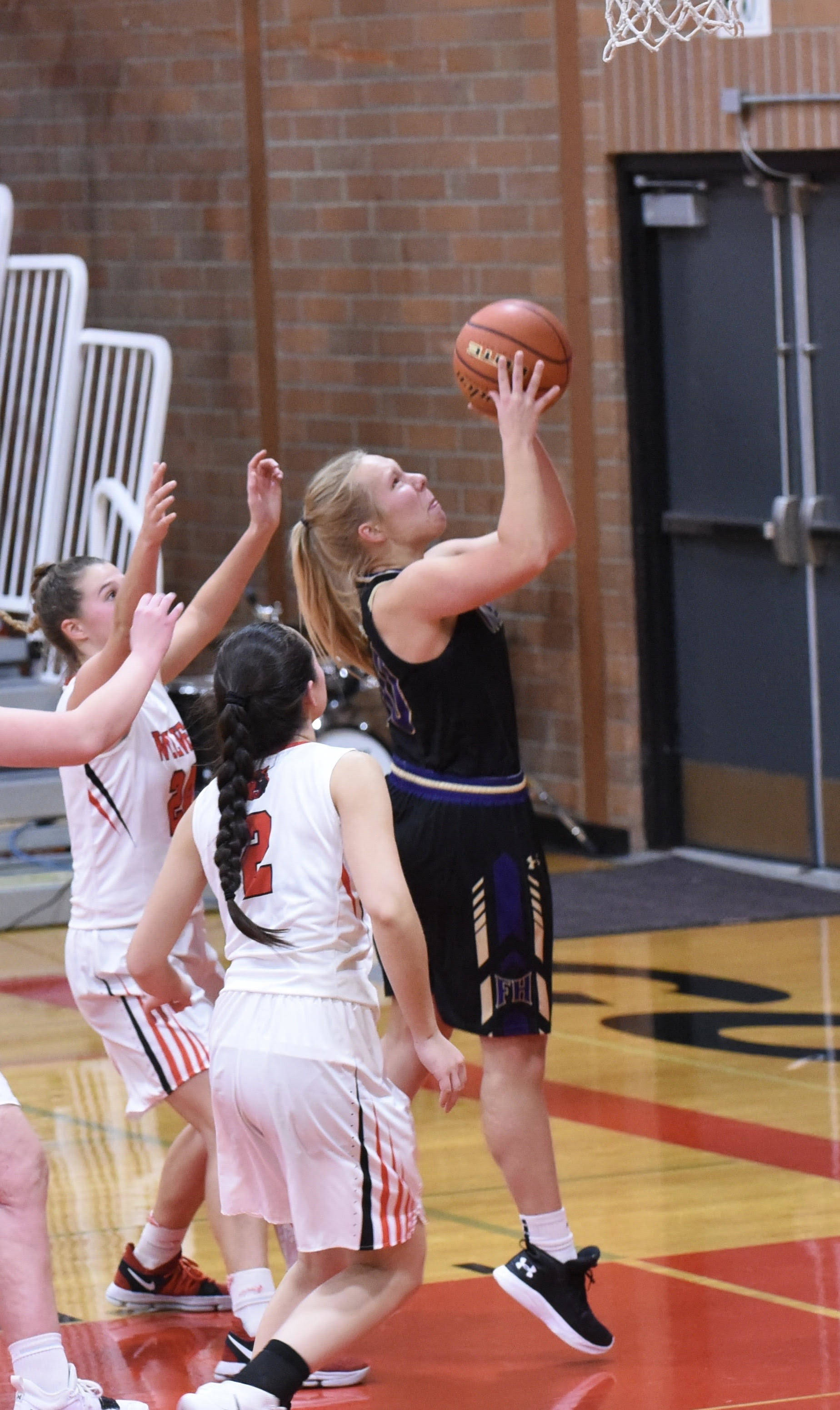Contributed photo/John Stimpson                                Tori Polda goes up for two points.
