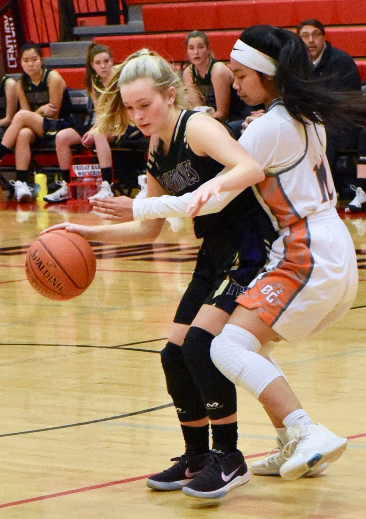 Contributed photo/John Stimpson                                Darcy Ayers maintains her cool under tight pressure from the defense.