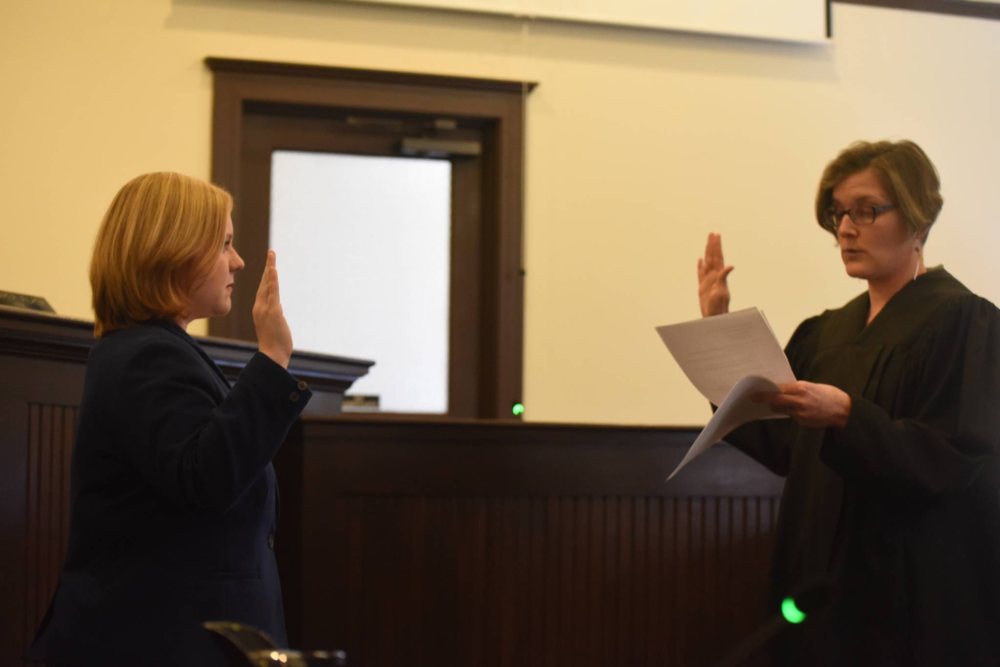 Staff photo/Tate Thomson                                Carolyn Jewett (left) being sworn-in by the Honorable Judge Kathryn C. Loring (right) on Jan. 11.