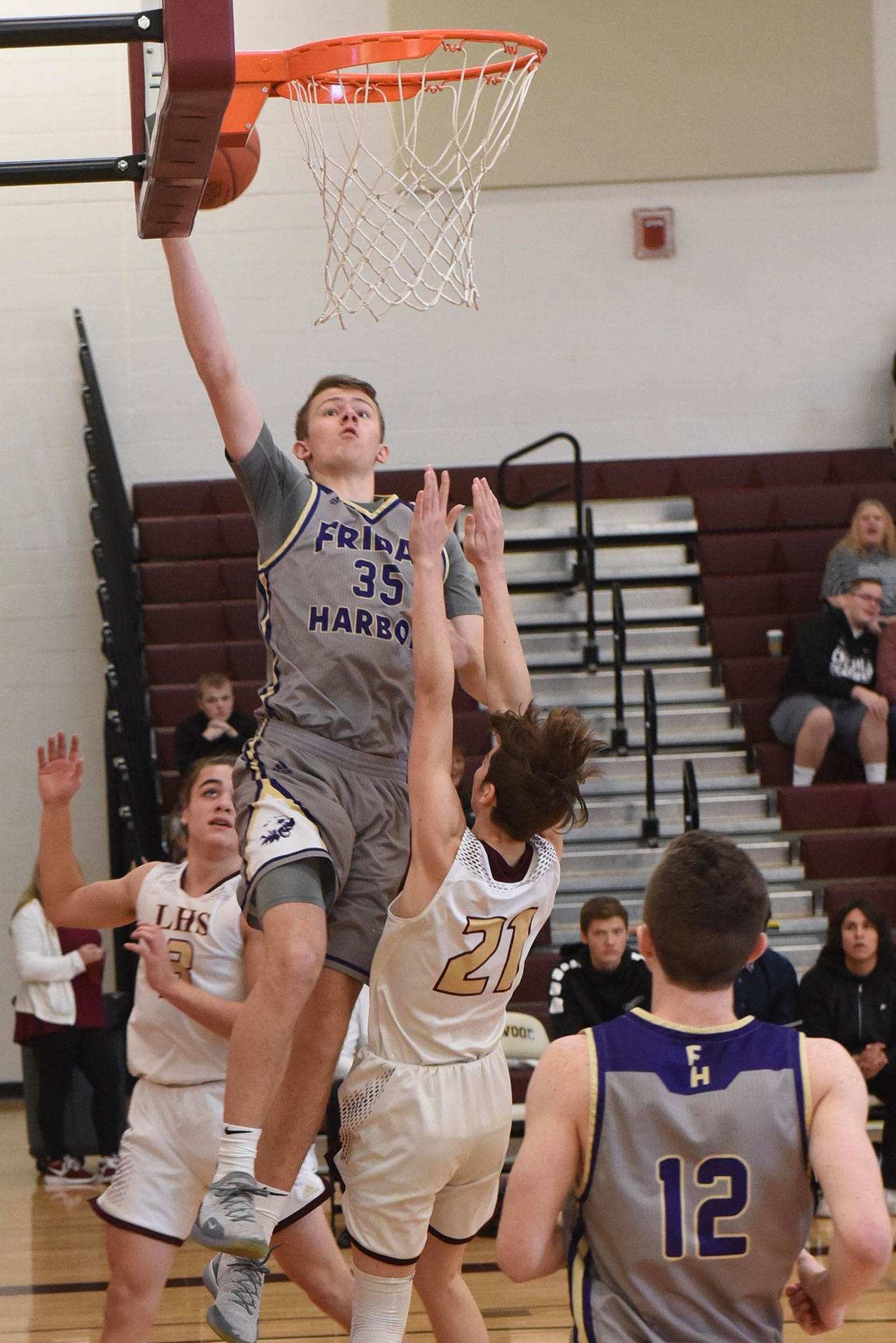 Contributed photo/John Stimpson                                Marshall Clark with a layup for 2 points.