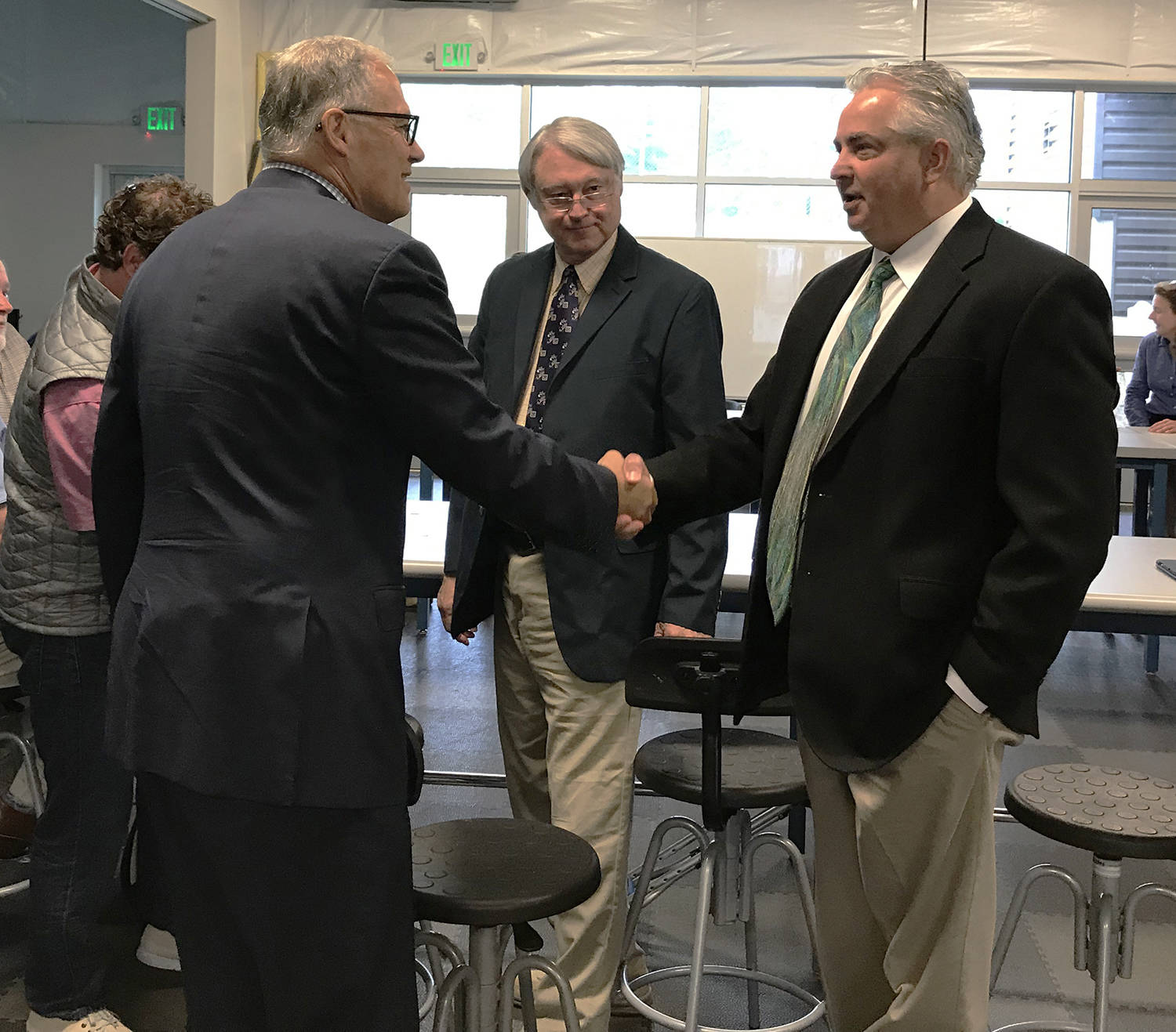 Contributed photo/OPALCO                                OPALCO General Manager Foster Hildreth and Board President Vince Dauciunas meet with Gov. Inslee.