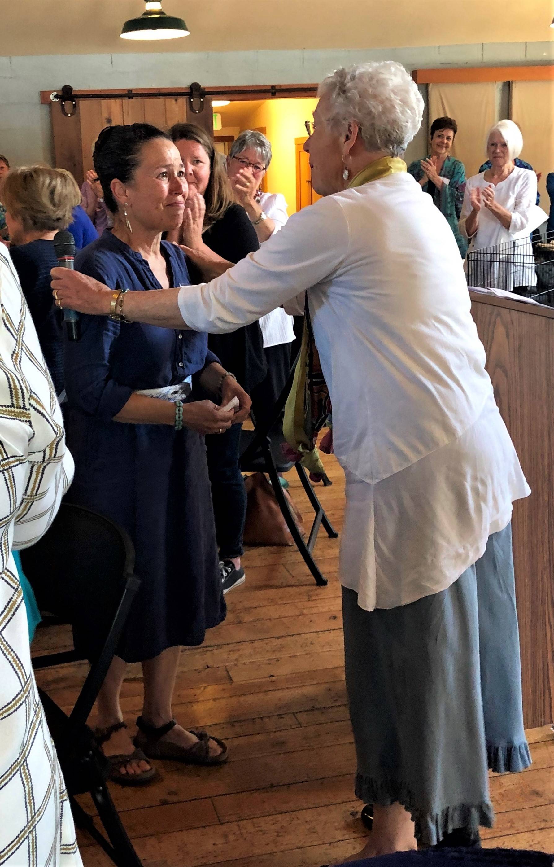 Contributed photo. San Juan Island Community Foundation/ Dr. Carolyn Haugen awards the 2019 Joyce L. Sobel Achievement Award to Dr. Mariluz Villa at the Women’s Fund Luncheon