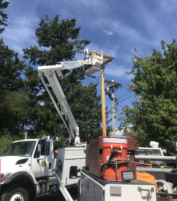 Contributed photo                                OPALCO crew work to strengthen islands power grid.