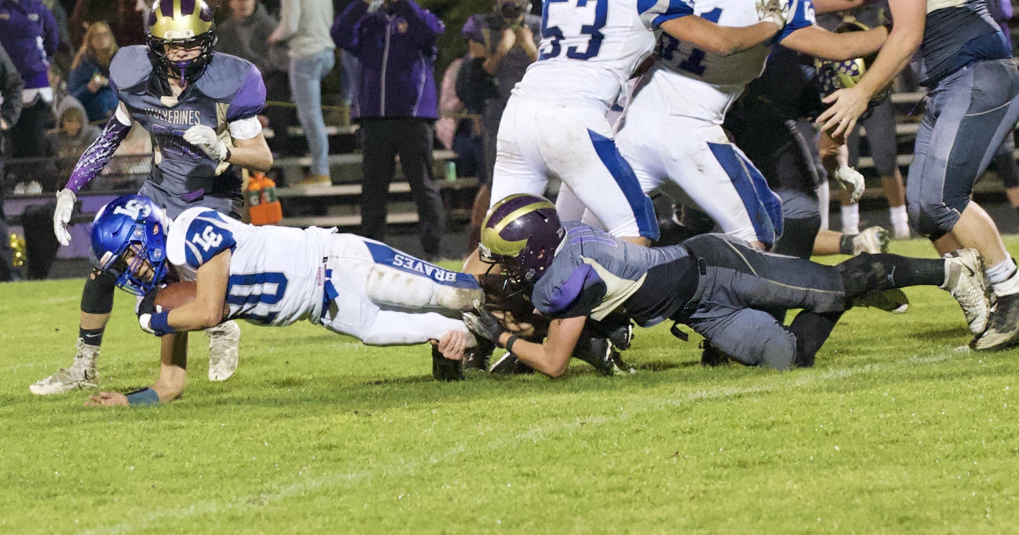 Jaden Jones, No. 10, tackles one of the Braves. (John Stimpson/Contributed photo.)