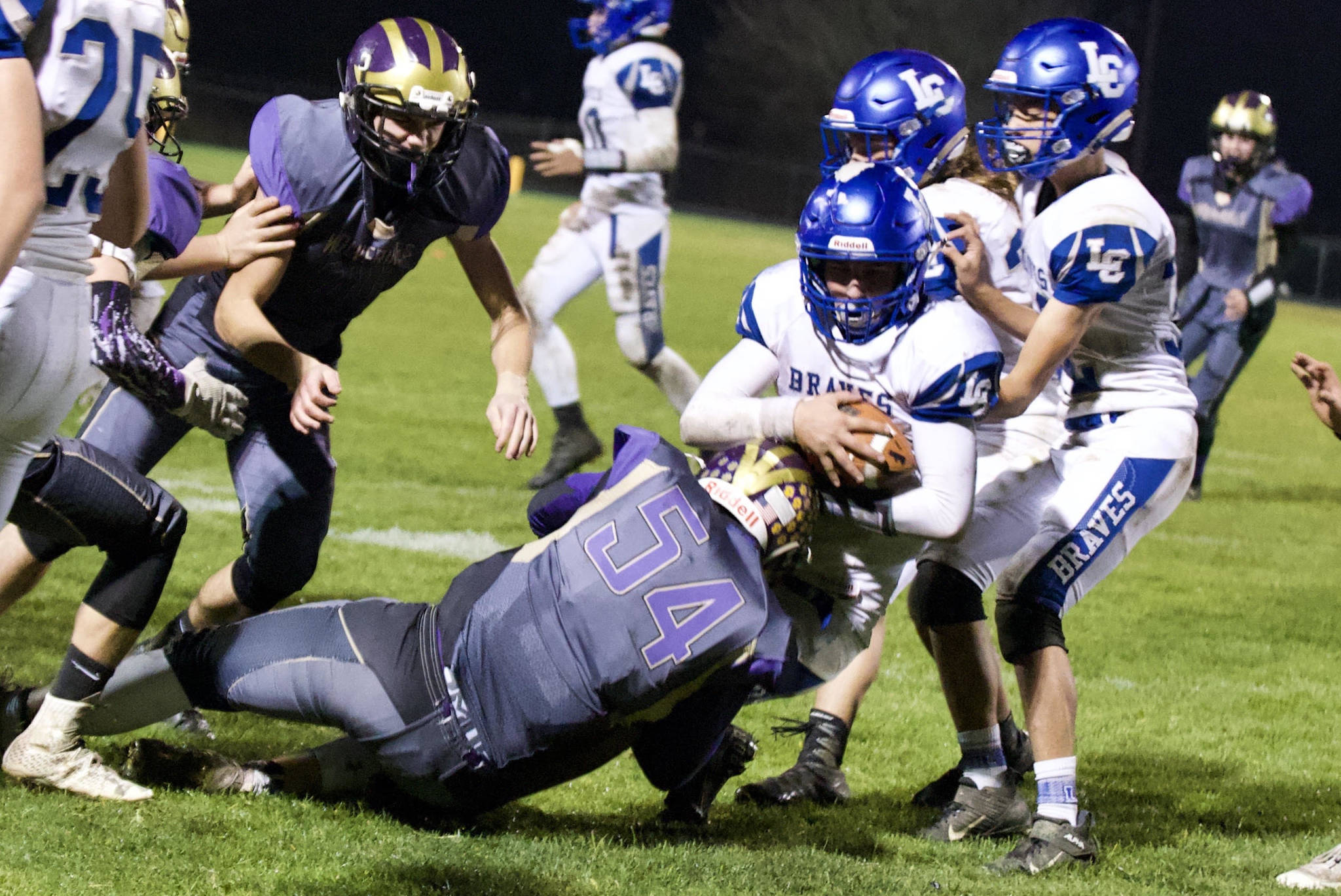 Gavin Mason, No. 54, puts a stop on the Braves ball carrier. (John Stimpson/Contributed photo.)