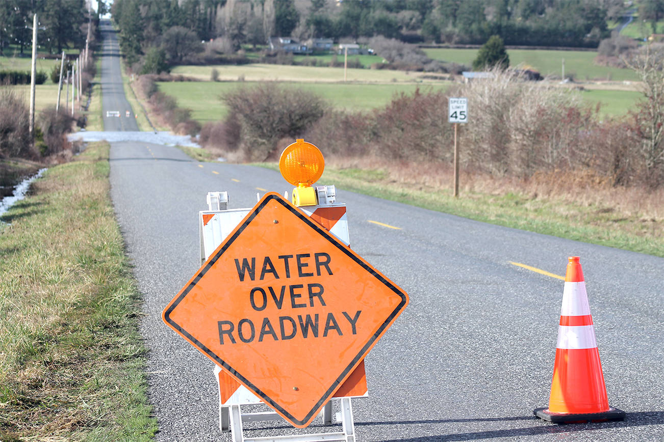 Flooding results in county road... - Journal of the San Juan Islands