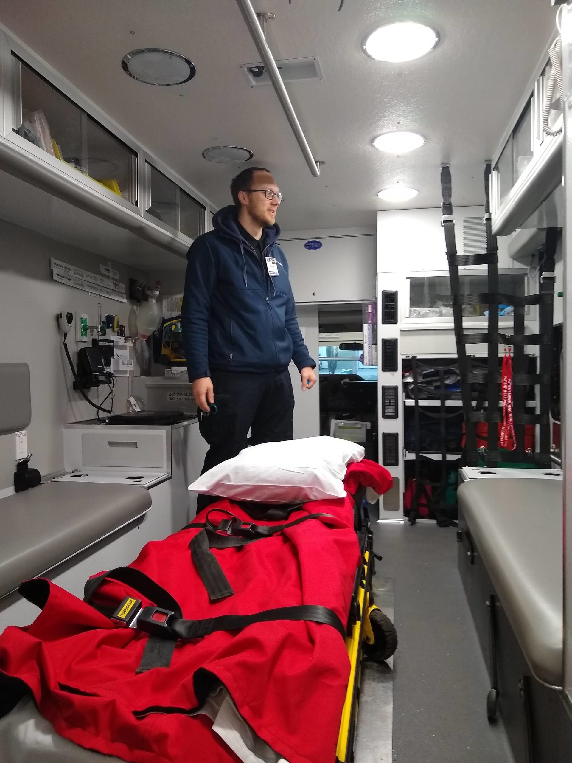 Contributed photo                                San Juan Island EMS emergency medical technician Ian Randall aboard one of the department’s ambulances.