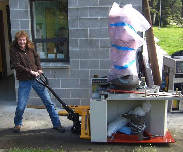In 2013 The Seaver Institute purchased for FHL the rebuilt Philips CM-10 electron microscope which Victoria uses to study RNA and DNA interactions, shown arriving here. She remains as delighted with it now as then. (G. Odell/contributed photo)
