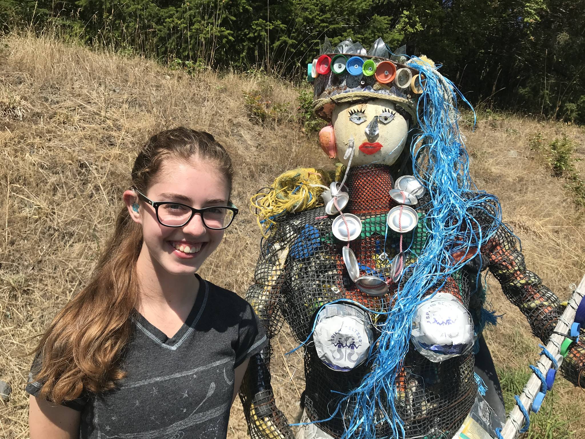 Contributed photo                                Kaia (left) with a mermaid made of litter at the Lopez Dump.