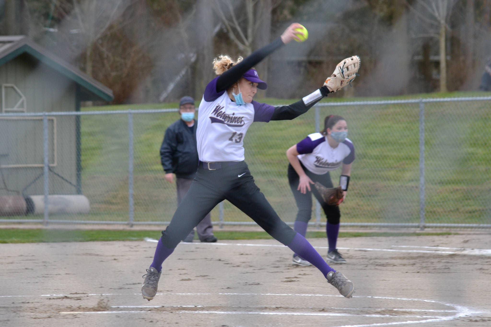 Senior Raylee Miniken pitches against Coupeville on March 19. The girls lost 8-3 at home against the Wolves. (Jennifer Ayers/contributed photo)