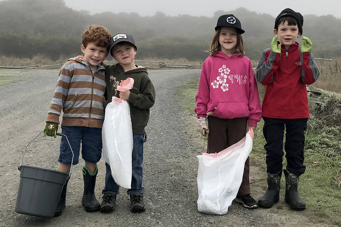 Contributed photo
Young volunteers pose with their garbage collecting bags during a previous Great Islands Cleanup.